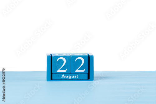 Wooden calendar August 22 on a white background