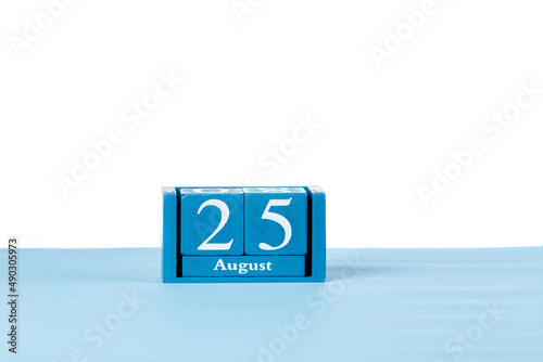 Wooden calendar August 25 on a white background