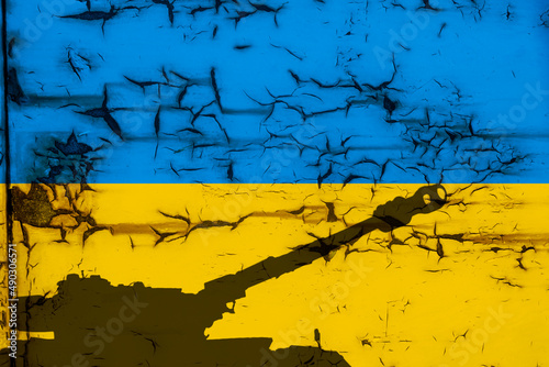 Russian battle tank with Ukrainian flag on rusted metal