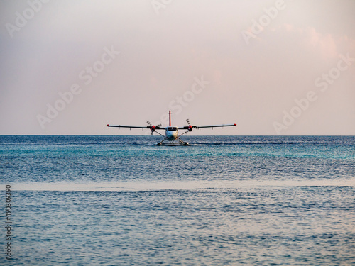 Seaplane landing in a lagoon on a Maldives island, , Kuredu, Lhaviyani Atoll, Maldives, Indian Ocean, Asia