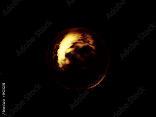 Blurry image of a shiny crystal ball with abstract blurry colorful pattern.