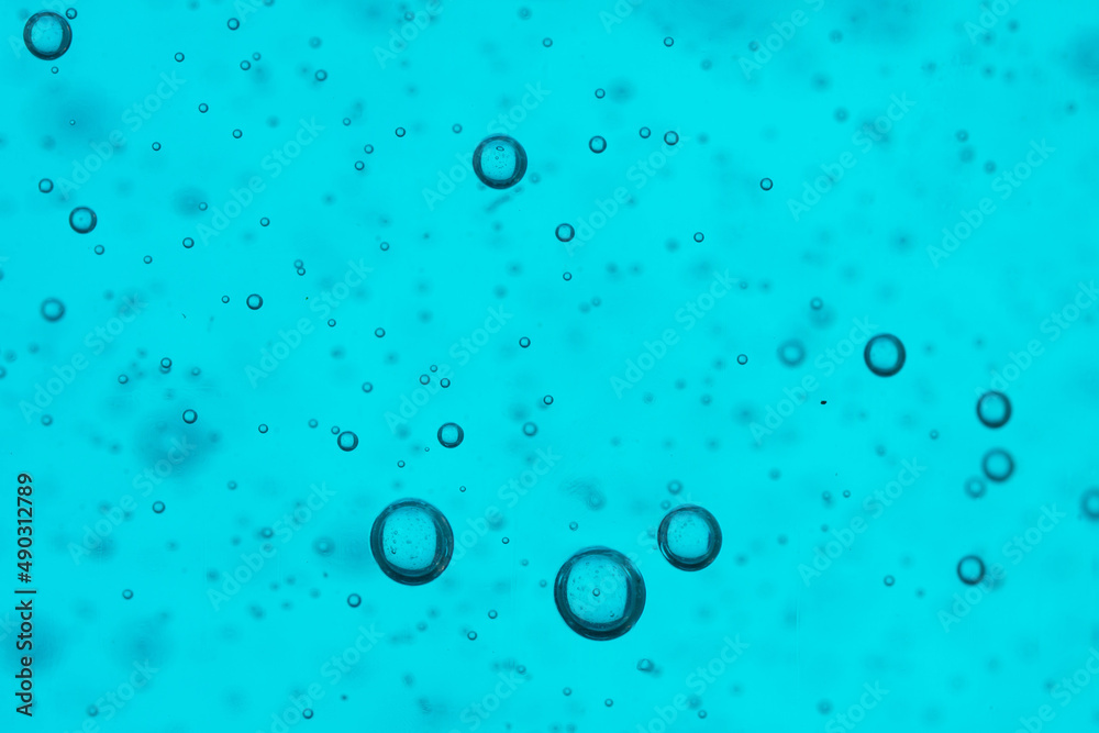water drops on teal background water drops on teal background
