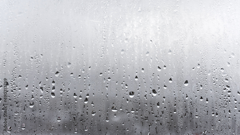 Texture of a drop of rain on a glass wet transparent background, humidity and foggy blank Texture of a drop of rain on a glass wet transparent background, humidity and foggy blank
