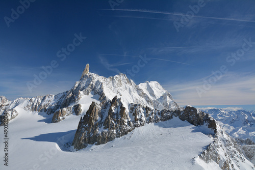 Winter alps mountains and blue sky.
