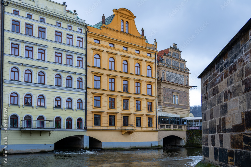 Historic grain mills next to the famous Charles Bridge in the center of Prague