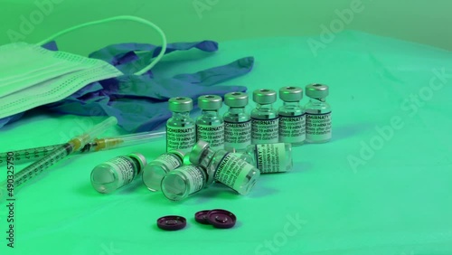 Cracow Poland - February 2022: Covid-19 Coronavirus Vaccine. Its for injecting medical professionals and people at risk. Syringe with liquid vaccines for children or older adults. Medical concepts.