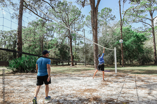 family playing volleyball in moss park in Orlando Florida Lake Nona  photo