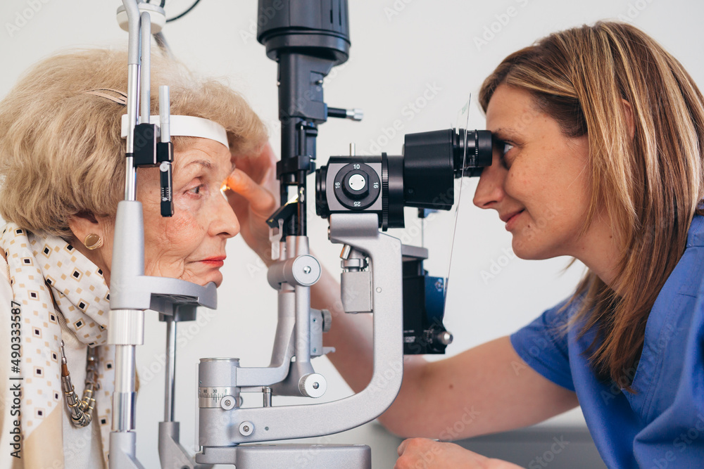 Fototapeta premium senior woman having eyesight examination.