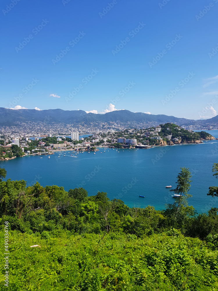 Vertical photo of the port of Acapulco taken from La Roqueta Island