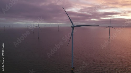 Windtubine 3 Nederland IJsselmeer met zware bewolking photo