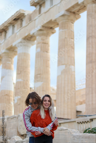 Couple of friends hugging each other at the acropolis © NOWRA photography