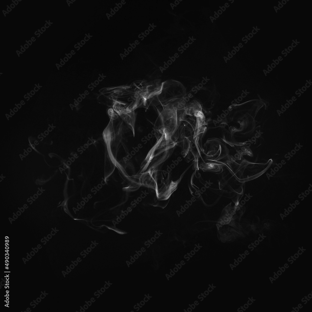 Abstract smoke texture over black. Fog in the darkness.