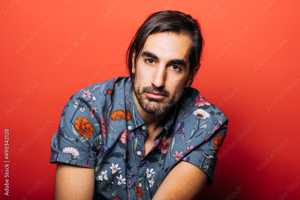 Confident man near red wall Confident man near red wall