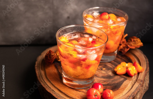 Brazilian Caipirinha, made with Acerola(Barbados Cherry) and cachaça, traditional drink from Brazil. 