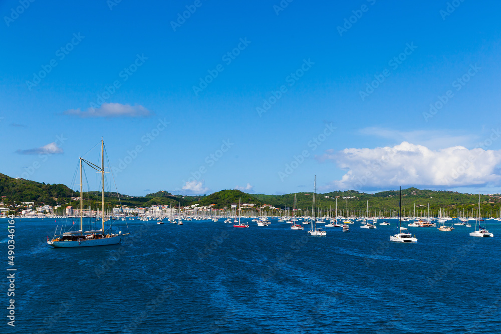 Bay of the island of Martinique French Polynesia. Yachts stand in the bay in the summer. Holidays in Martinique.