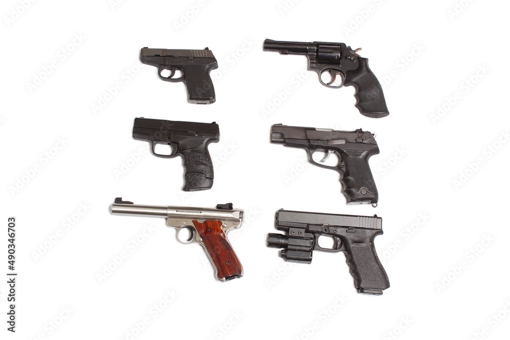 Collection of Handguns Isolated on White Background