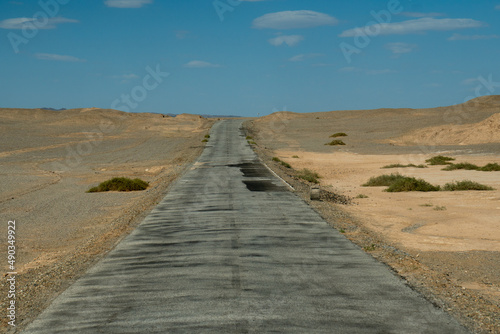 The road in the desert. in Dunhuang Yardang National Geopark, Gansu China. photo