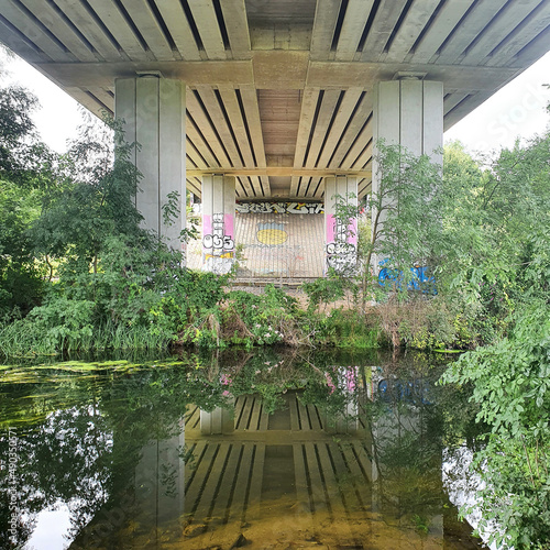 Bridge over River with Graffiti  photo