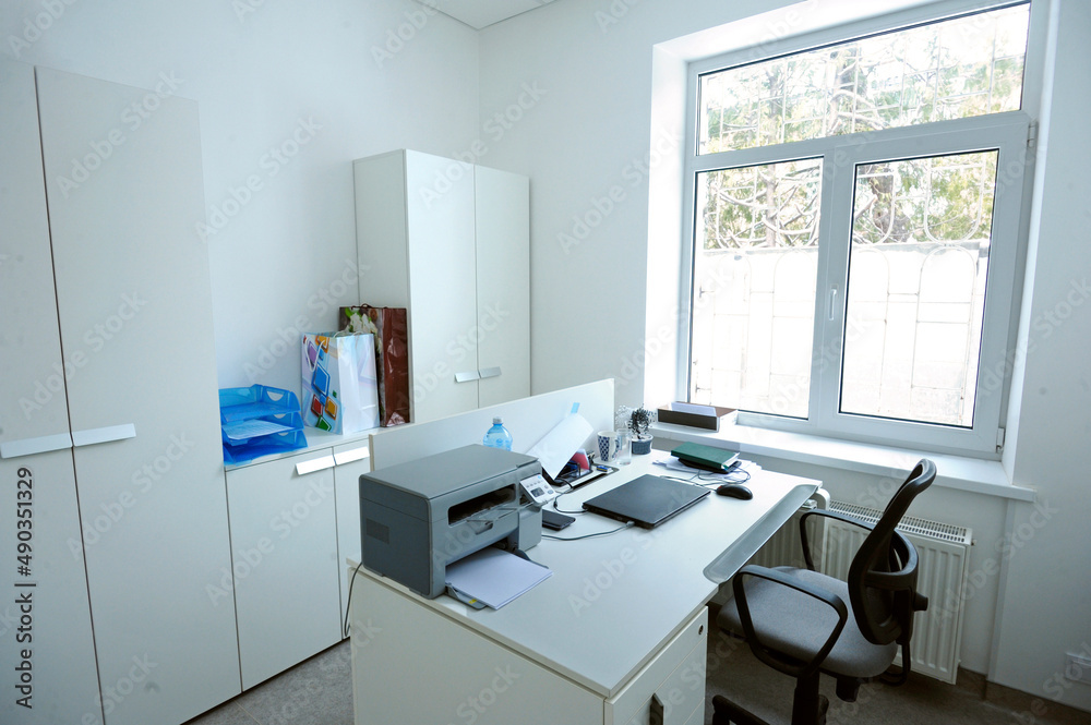 Empty accountant room. Worktable, chairs, office furniture and equipment