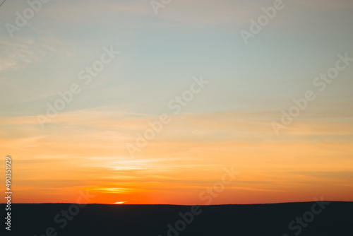 Art landscape with a view of the city and sunset. With film, grain and blur effects