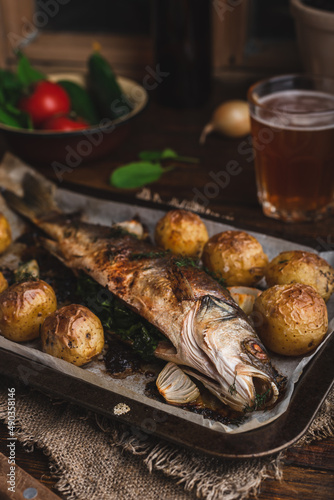 Baked Sea Bass Stuffed with Sorrel on Baking Tray