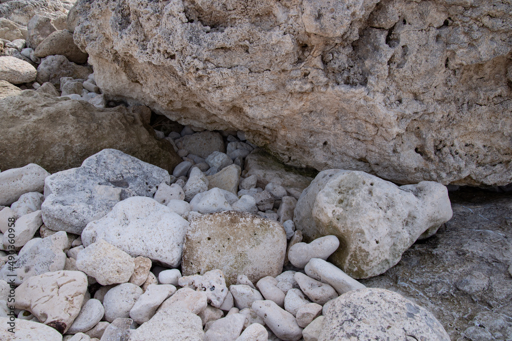 Stone mountains and cliffs. Close-up rocks by the sea. Natural background. Stone mountains and cliffs. Close-up rocks by the sea. Natural background.