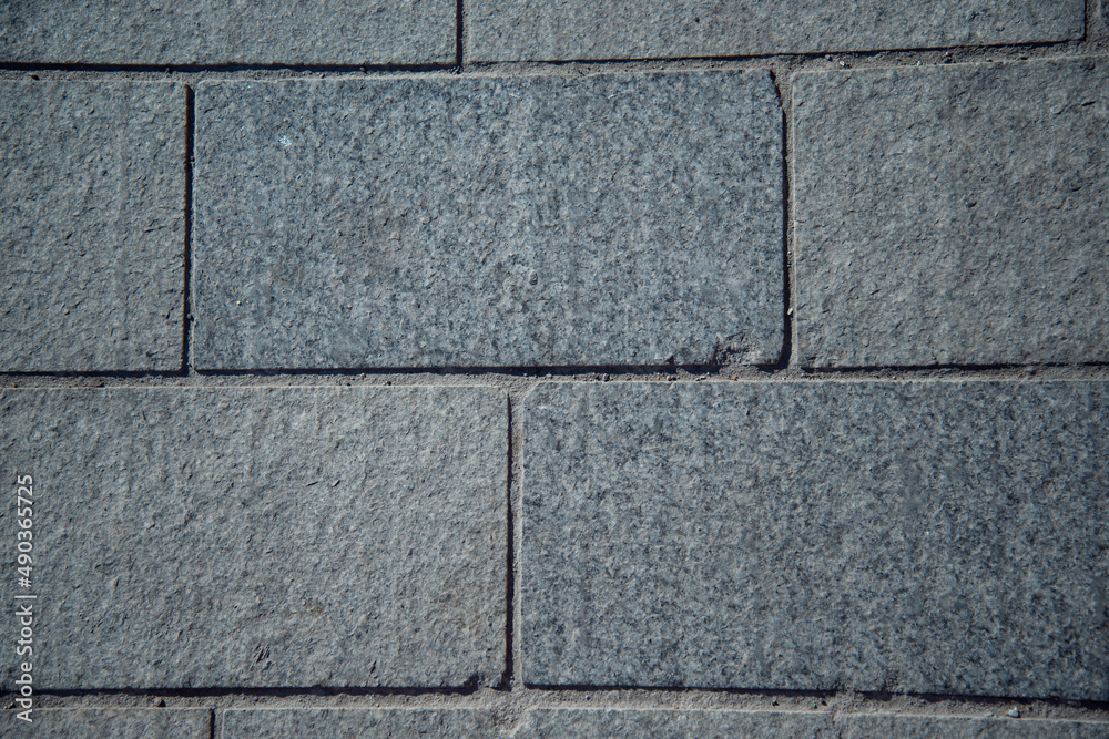 Obraz premium Gray concrete tiles. Stone background. Rectangular figures.