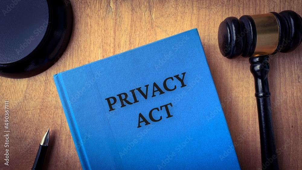 Privacy act and gavel on a table. Law concept Privacy act and gavel on a table. Law concept
