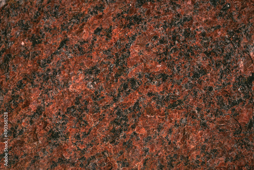 Seamless texture - the surface of natural stone with red spots