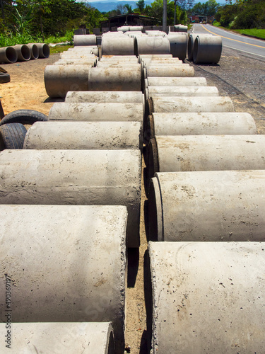 Rows of big concrete pipes in a factory at the side of the road near the town of Miniquira, in the eastern Andean mountains of central Colombia.