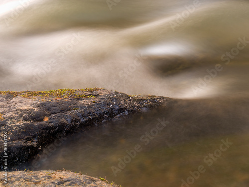 Multiple long exposure composite of the stream of the Moniquira river, a tropical tributary of the Suarez river, captured near the town of the same name in central Colombia. photo