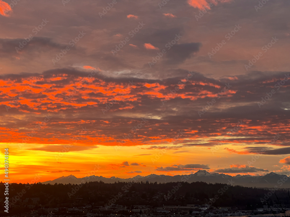 Colorful Sunset Over The Olympic Mountains From Seattle