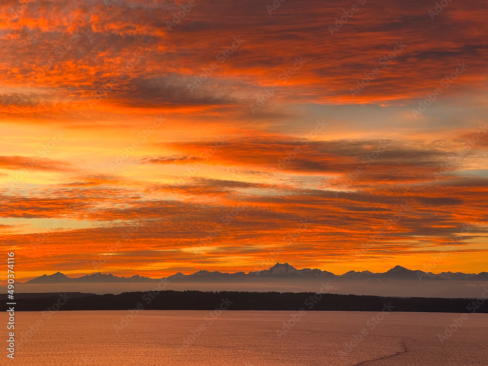 Sunset over the Olympic Mountains and Puget Sound in Seattle Sunset over the Olympic Mountains and Puget Sound in Seattle