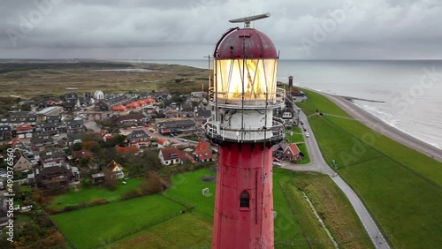 Lighthouse tower Lange Jaap in Den Helder drone aerial footage 5K along the sea near the island of Texel in North Holland, The Netherlands.