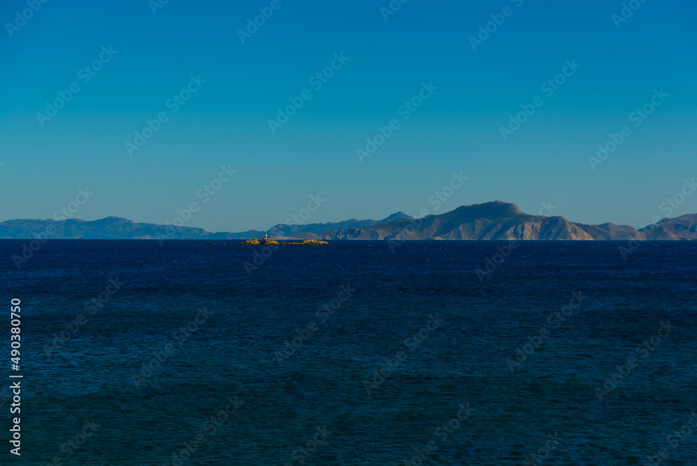 DATCA, TURKEY: Lighthouse and Seascape in the town of Datca on a sunny day.