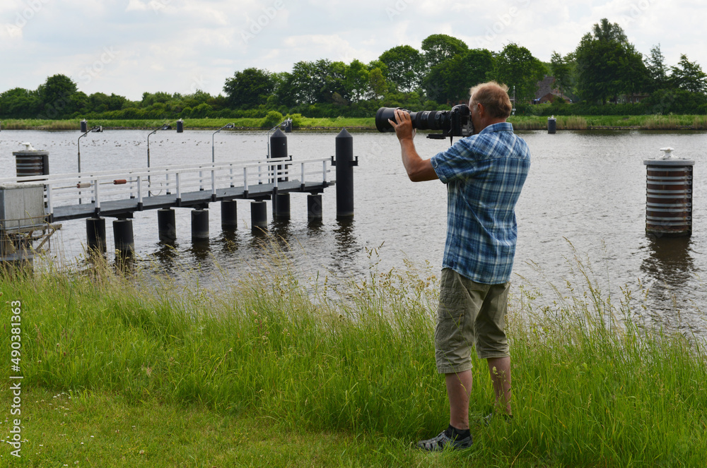 Fototapeta premium Fotograf am Nord-Ostsee-Kanal 