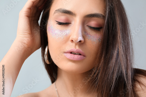 Beautiful young woman with ...