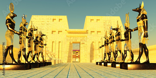 Avenue of Egyptian Gods - Several Egyptian god statues and sphinx line the entrance to a sacred temple in Egypt. photo