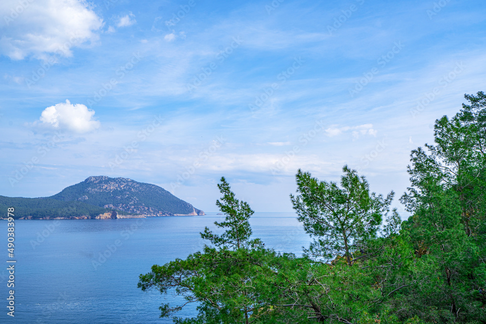 The Bay of Adrasan extends along more than 2.5 km of Antalya, naturally protected area, surrounded by a national park with pine forests, Taurus Mountains, blue water lagoons and sandy beaches. The Bay of Adrasan extends along more than 2.5 km of Antalya, naturally protected area, surrounded by a national park with pine forests, Taurus Mountains, blue water lagoons and sandy beaches.