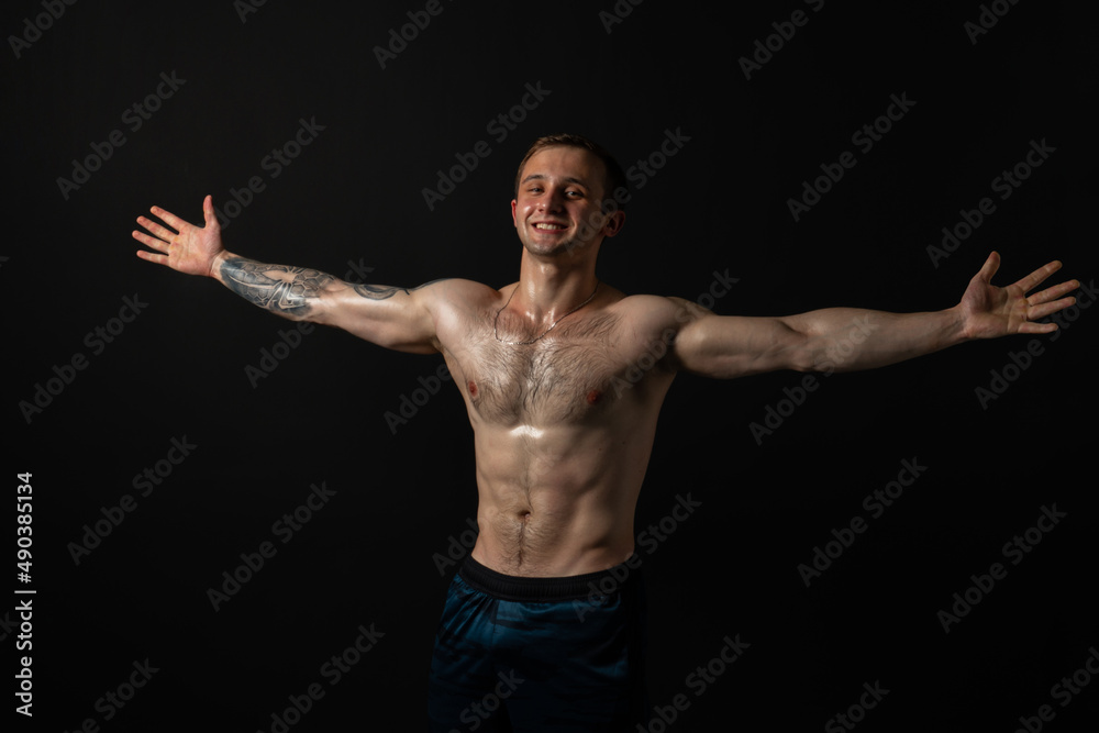 Man on black background keeps dumbbells pumped up in fitness active sexy torso, training man athletic heavy, person Young metal, gym fit