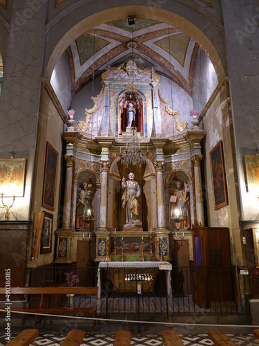 Side altar with sculptures of saints in the parish church of Sant Bartomeu, Soller, Mallorca, Balearic Islands, Spain