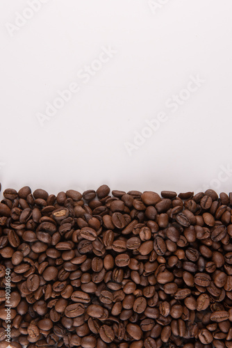 coffee beans white background © Layn