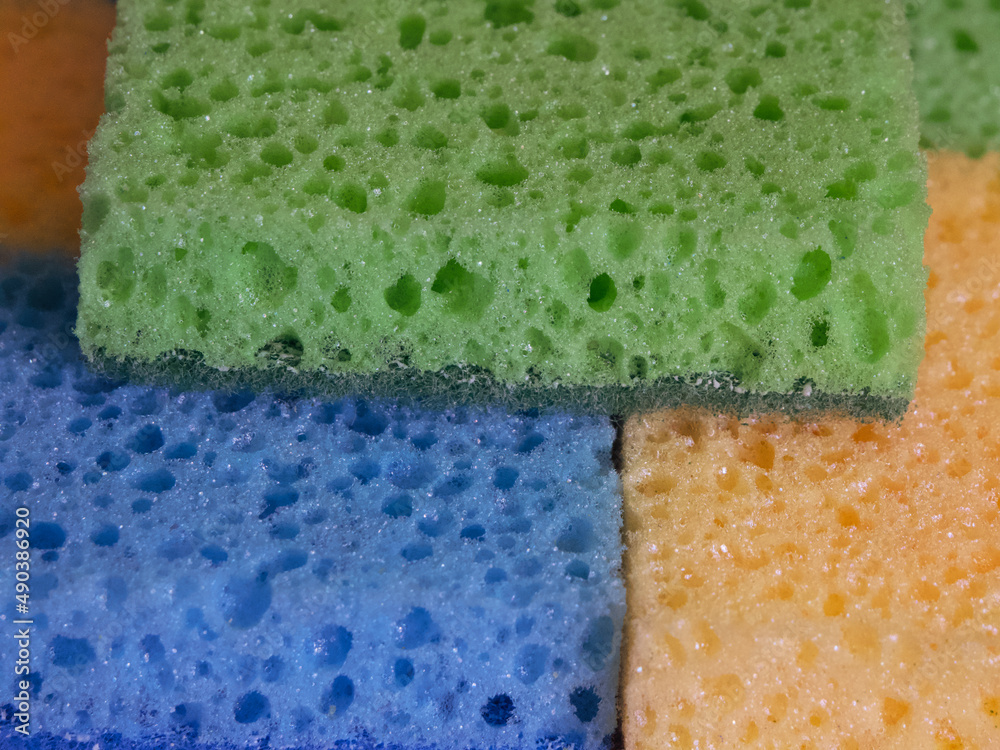A few colorful sponges, a close-up shot. A few colorful sponges, a close-up shot.