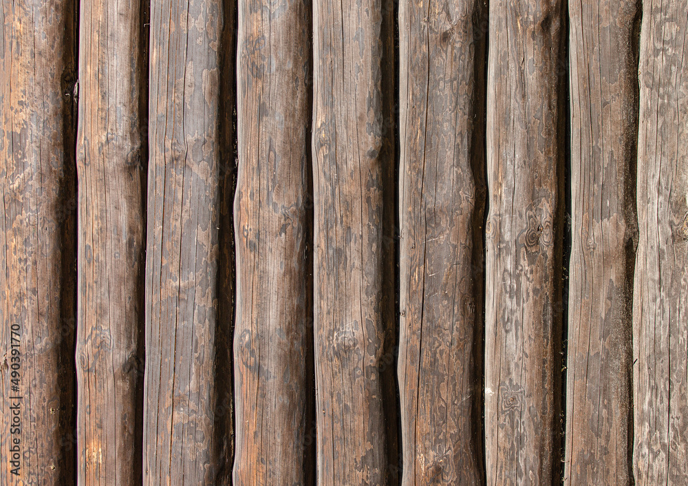 Log wall of wooden blockhouse house close-up.