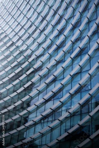 architectural geometric background in glass perspective - geometric pattern of modern business facade
