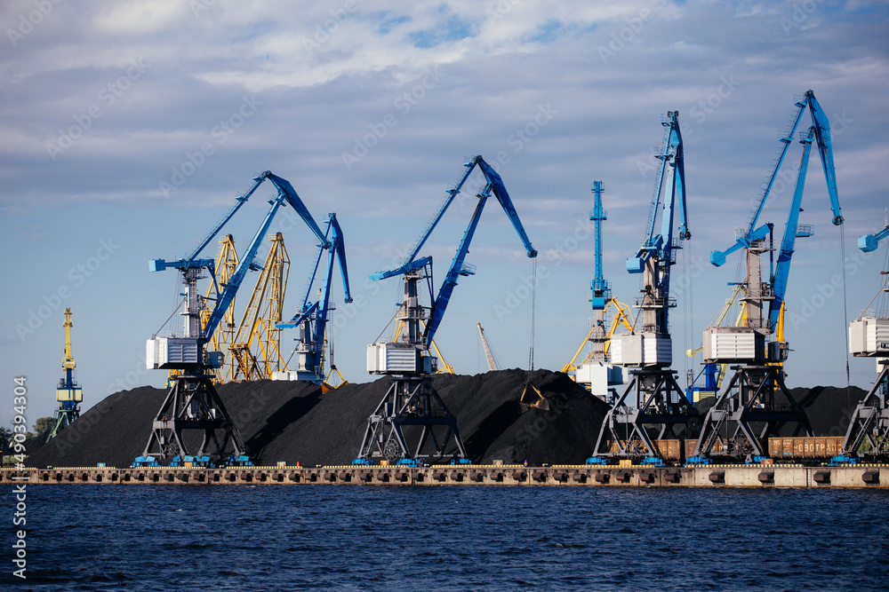 cranes in industrial harbor