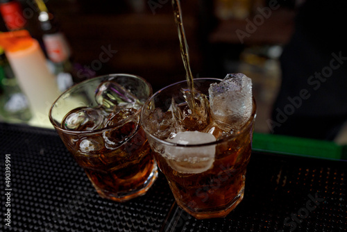 glass of cola with ice