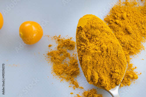Spoonful of turmeric powder for cooking
