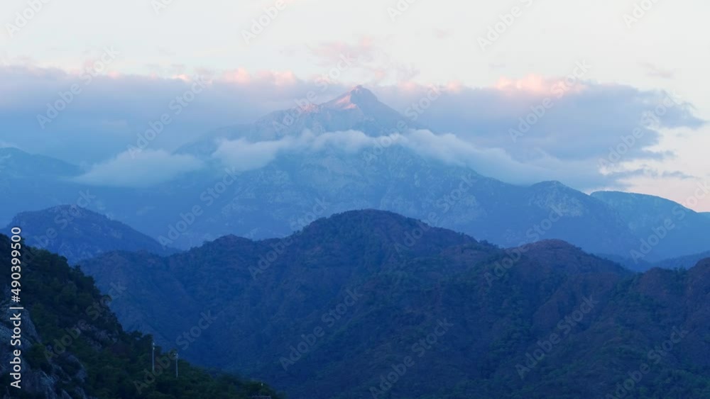 Narrow fow of Tahtali mountain peak surrounded by clouds Aerial view of Antalya mountain range Narrow fow of Tahtali mountain peak surrounded by clouds Aerial view of Antalya mountain range