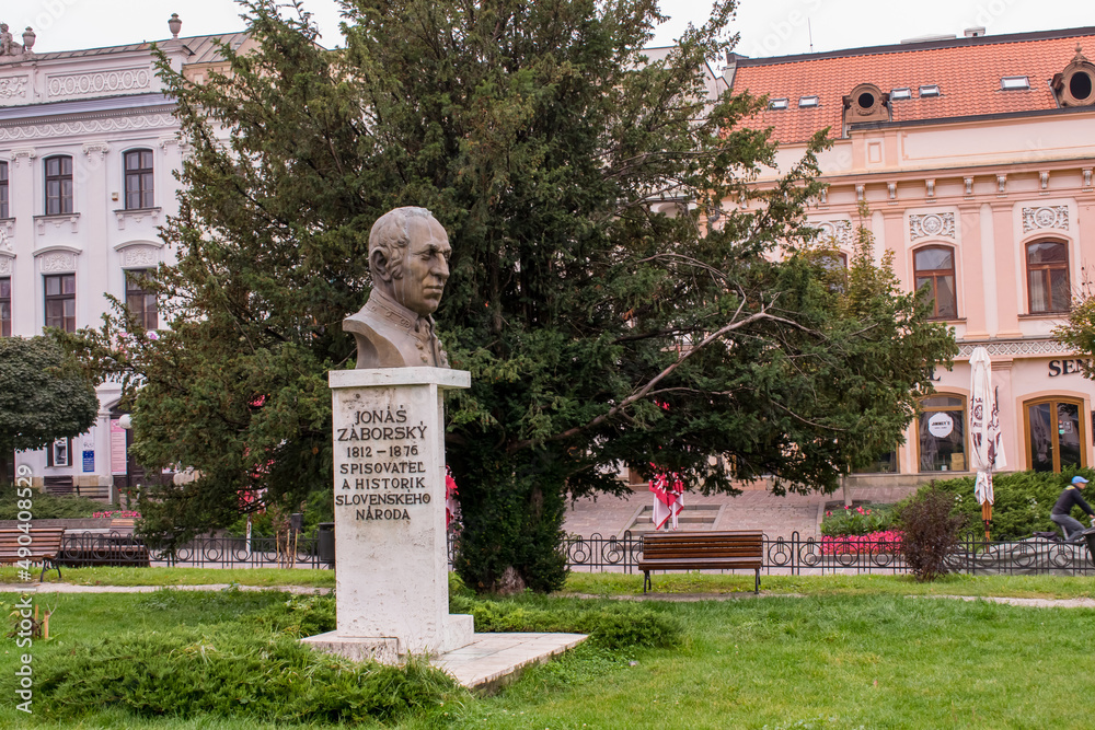 Fototapeta premium Stone monument with the image of the bust.